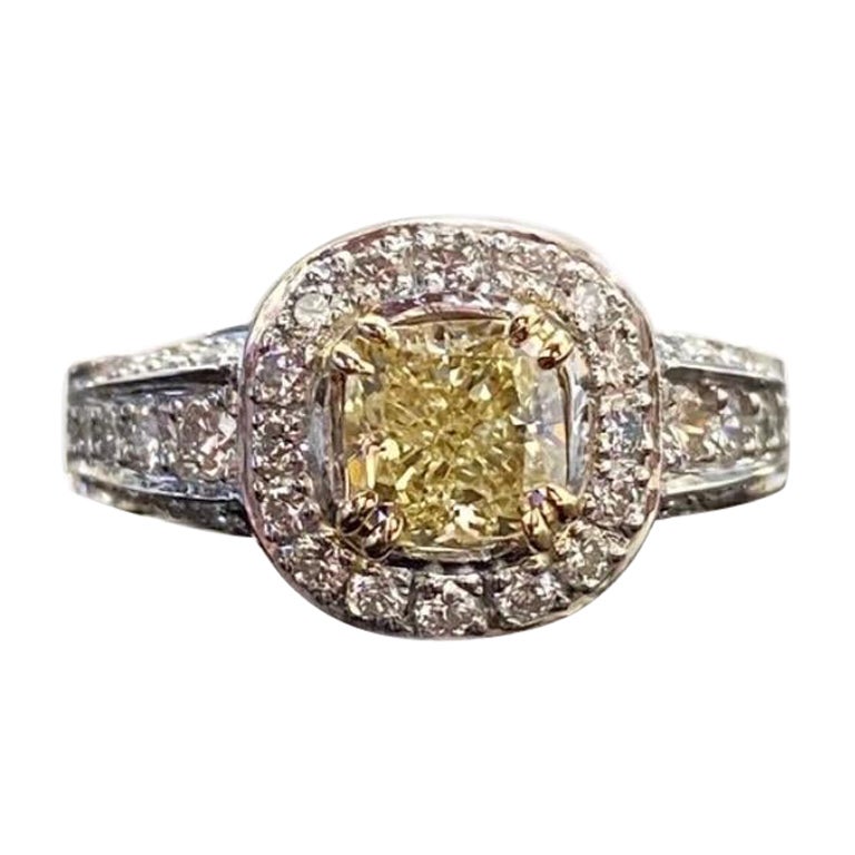 GIA Certified 1.28 Carat Fancy Light Yellow Cushion Cut Diamond Engagement Ring For Sale