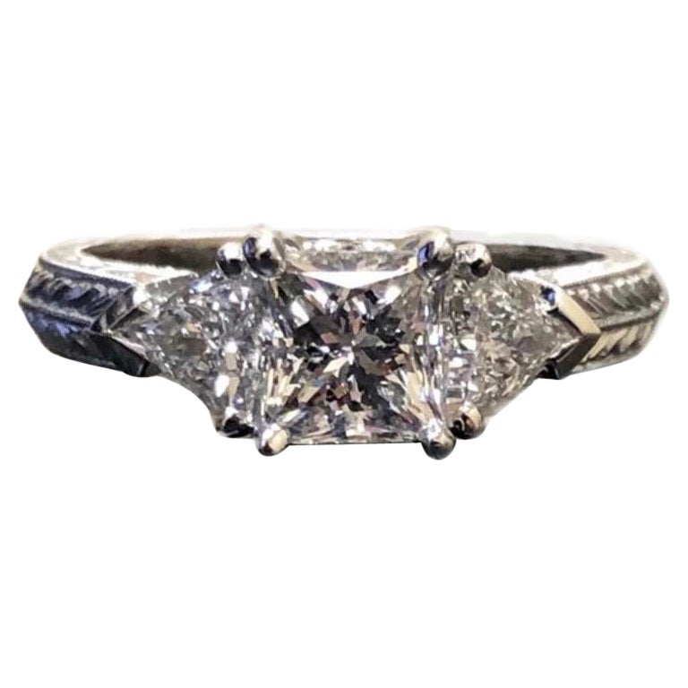 Art Deco Hand Engraved Platinum Three Stone Princess Cut Diamond Engagement Ring For Sale