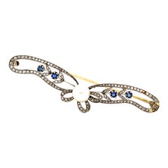 Antique Belle Epoque Platinum Ribbon Brooch with Pearl Diamonds & Sapphires