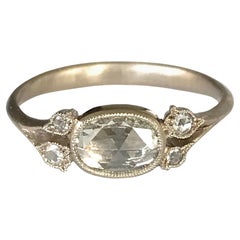 Dalben 0, 57 Carat Oval Shape Rose Cut Diamond Gold Ring
