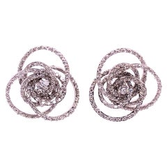 18 Karat White Gold Diamond Flower Swirl Stud Earrings by H2 at Hammerman