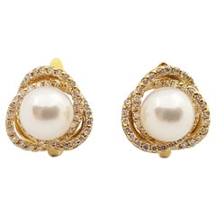 Pearl with Diamond Earrings Set in 18 Karat Gold Settings