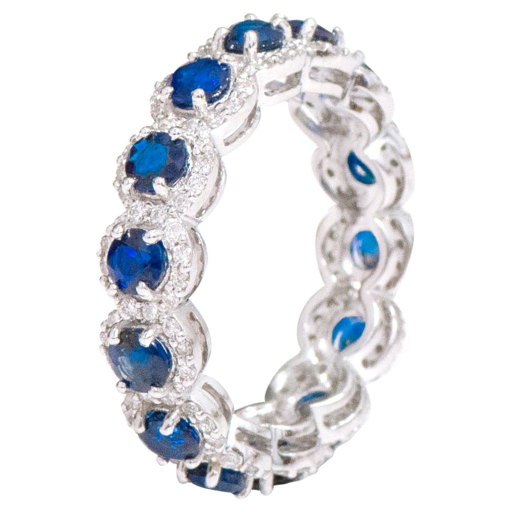 18 Karat White Gold 3.39 Carat Sapphire and Diamond Cluster Eternity Band Ring For Sale