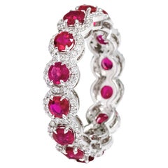 18 Karat White Gold 3.39 Carat Ruby and Diamond Cluster Eternity Band Ring