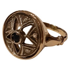 Gold and Silver Ring with Diamond and Sapphire Rosettes from the Early 1900s