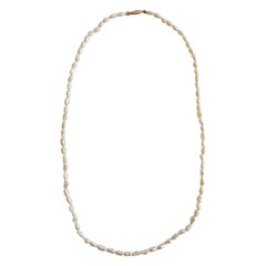 White Freshwater Pearl Strand with 14kt Yellow Gold Pearl Clasp