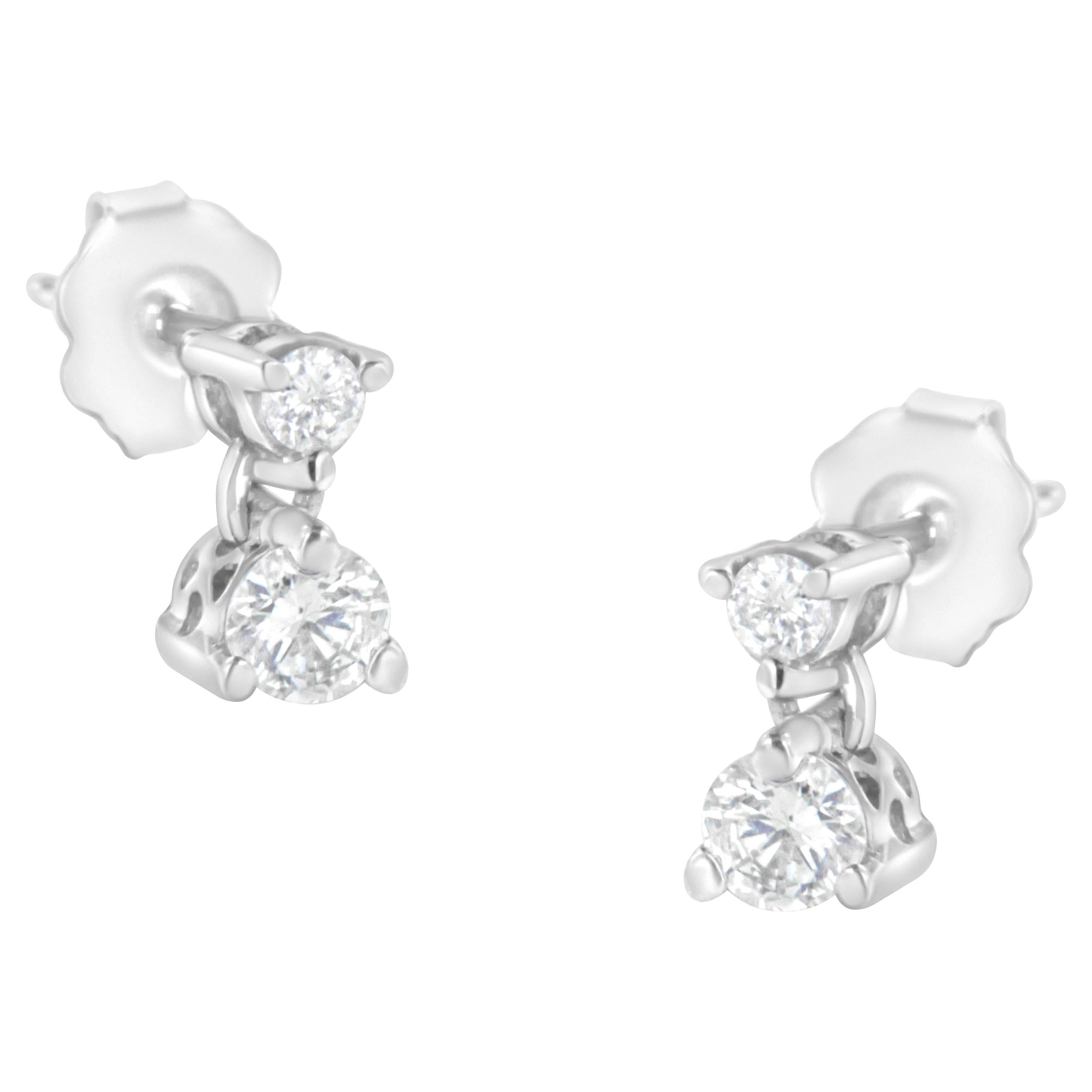 Clous d'oreilles pendants en or blanc 14 carats avec double diamant de 1/2 carat