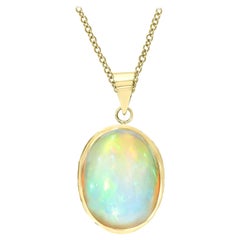 15 Carat Oval Ethiopian Opal Pendant / Necklace 14 Karat Yellow Gold Necklace