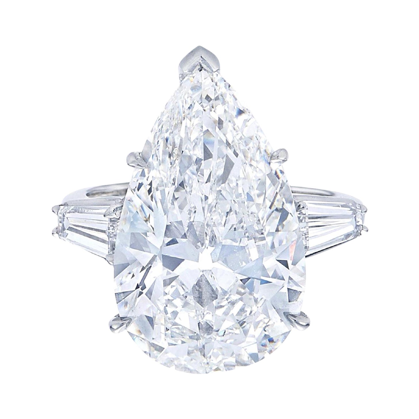 Embrace the epitome of sophistication with our Pear Cut Diamond Solitaire Engagement Platinum Ring. The star of the show is a dazzling 5-carat pear-cut diamond, exuding brilliance with its H color and showcasing remarkable clarity at VS2. This