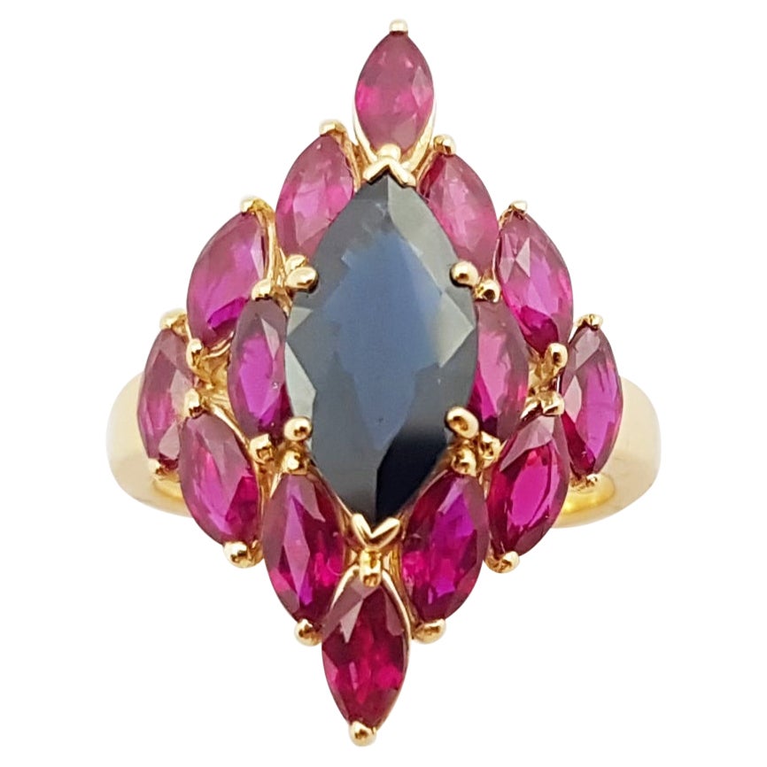 Blue Sapphire and Ruby Ring Set in 18 Karat Gold Setting For Sale