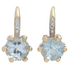 14 Karat Yellow Gold Drop Earrings with Topaz