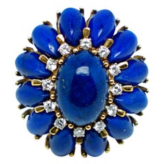 Vintage Flower Ring with Intense Blue Lapis Cabochon and Diamonds in Gold 18 Karats 