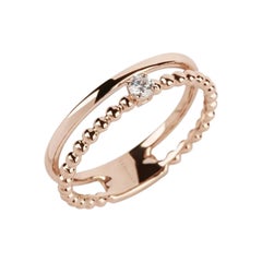 Bague à double anneau de perles en or rose 18 carats et diamants