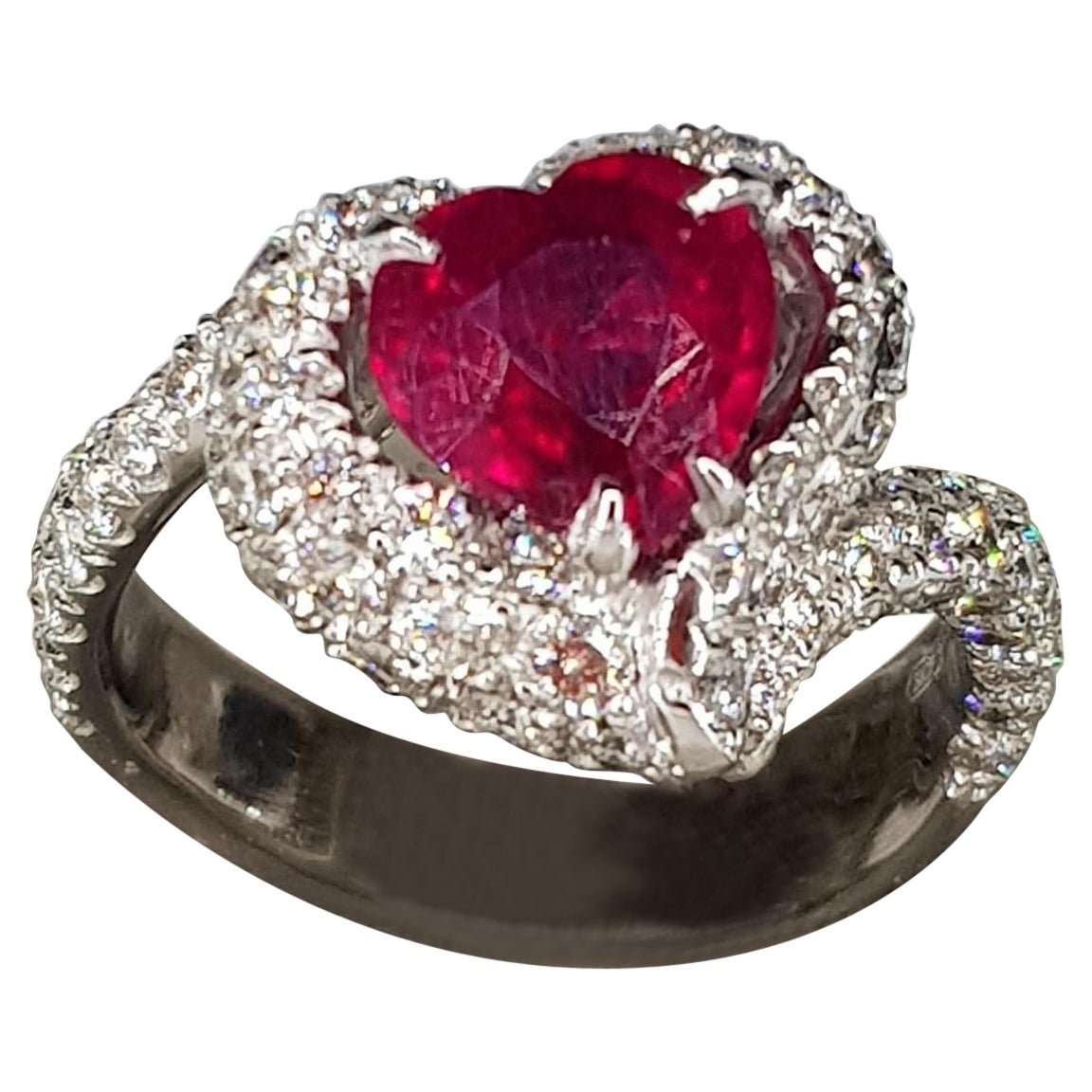 2.04 Carats Ruby with a pavé of 2.24 carats of white diamonds Cocktail Ring For Sale