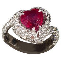 2.04 Carats Ruby with a pavé of 2.24 carats of white diamonds Cocktail Ring
