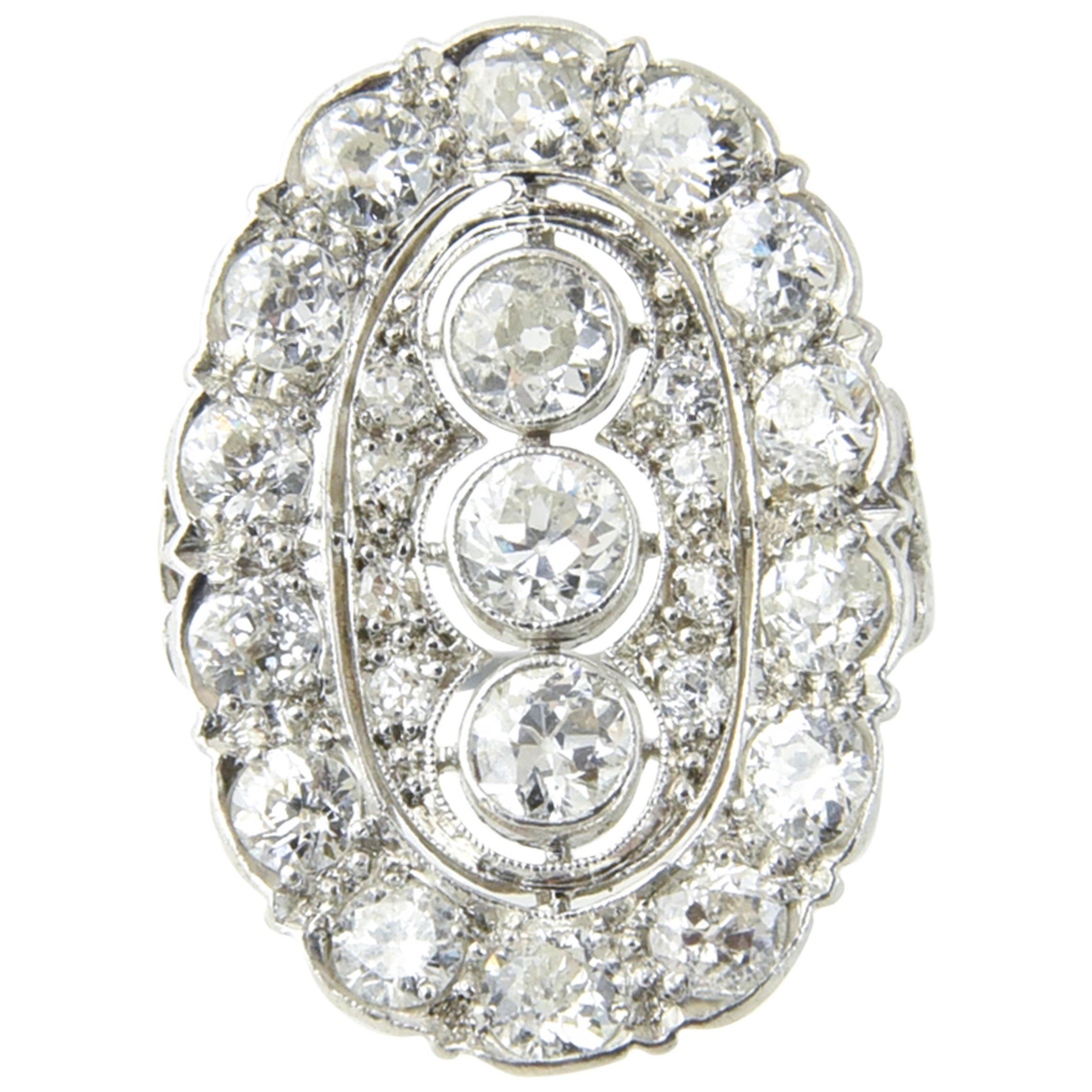 Edwardian Filigree Platinum Diamond Three-Stone Ring