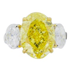 Emilio Jewelry 7.90 Carat Gia Certified Fancy Vivid Yellow Diamond Ring