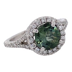 Platinum 0.25 Carat Diamond Halo Ring Featuring 1.17 Carat Green Tourmaline