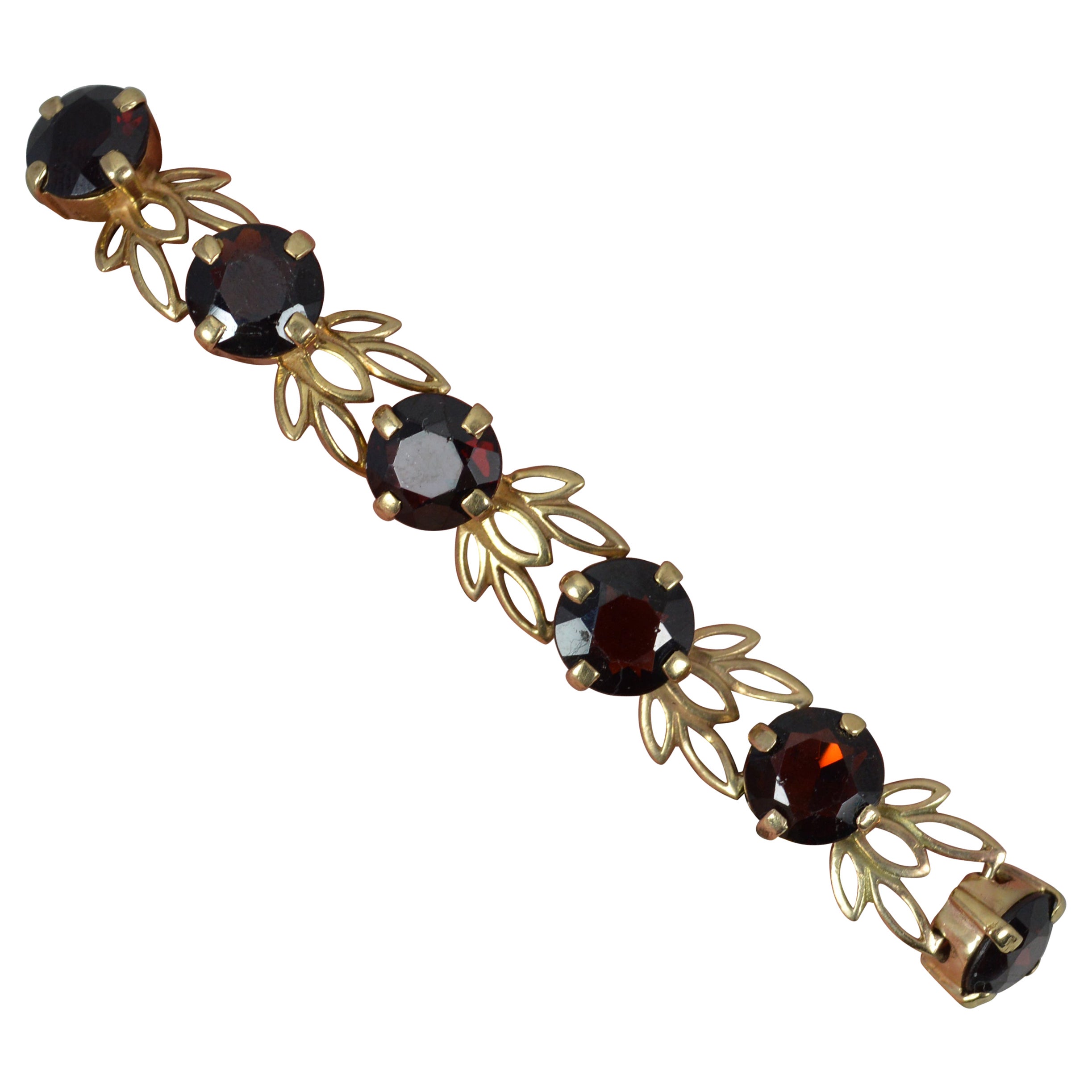 Solid 9 Carat Gold and Garnet Floral Bracelet For Sale