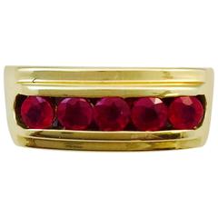 Retro Channel Set Faceted Ruby Gold Ring