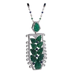 Collana Art-Deco con smeraldo, zaffiro blu e diamante da 53 carati