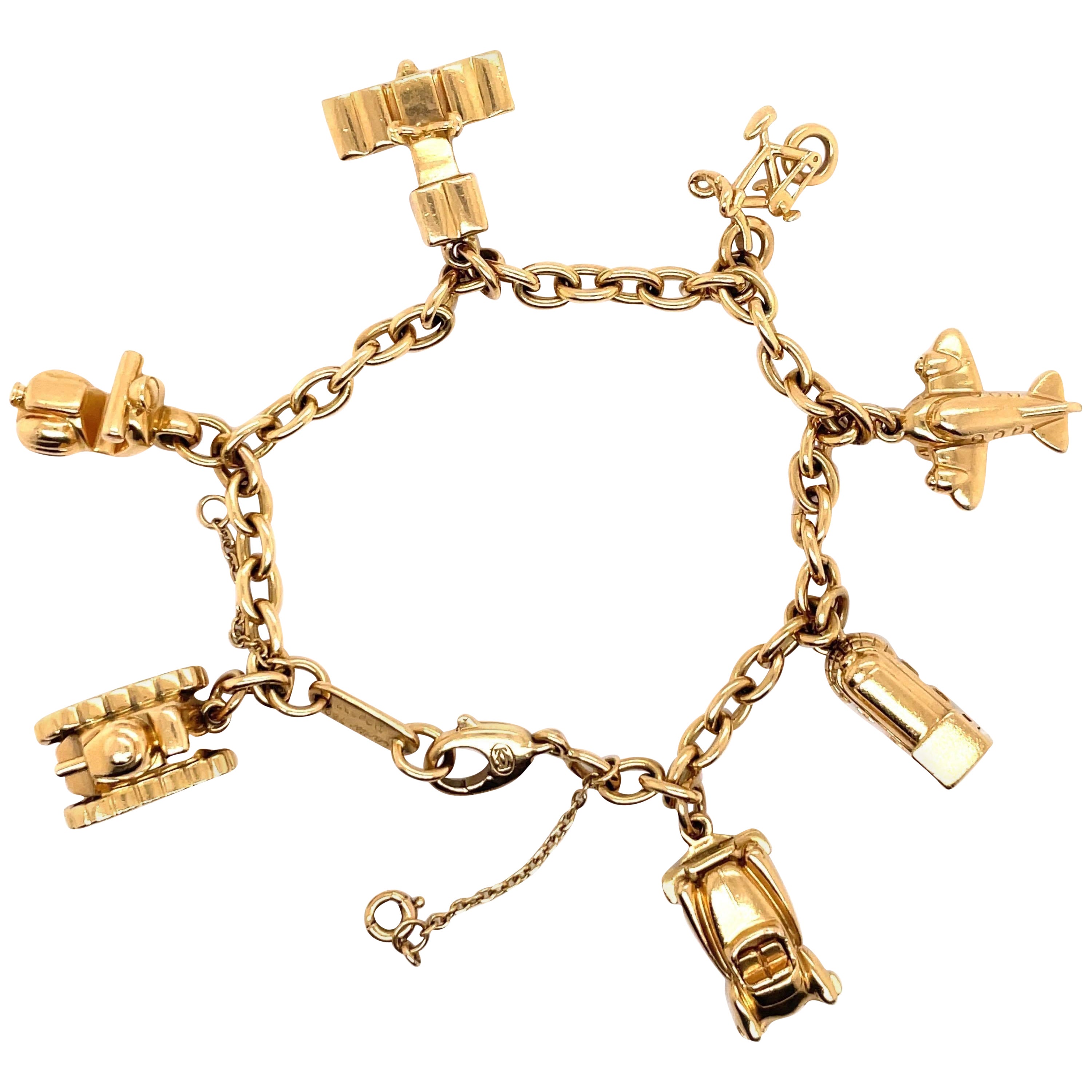 Cartier Traveling Charm Link Bracelet 18 Karat Yellow Gold 42 Grams For Sale