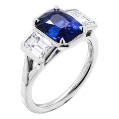 GIA Certified 3 Stone Ring with 3.31ct Blue Sapphire