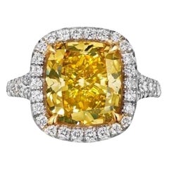 GIA Certified 5.05 Carat Vivid Yellow Cushion Cut Diamond Ring