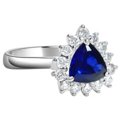 Blue Sapphire and Diamond Halo Ring