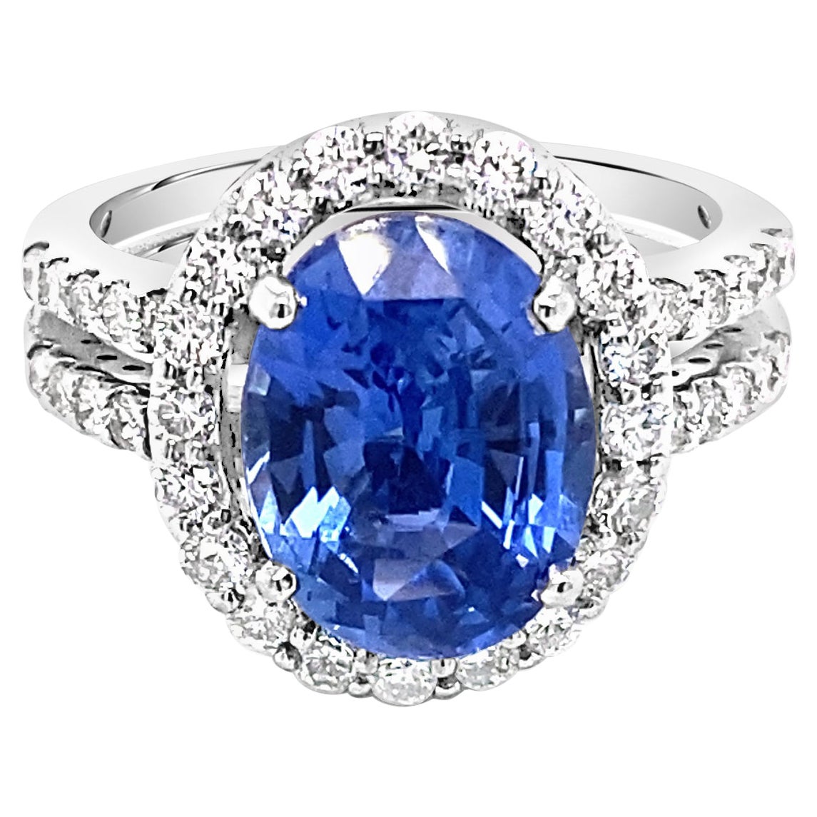 GIA 4.61 Carat Oval Burma Sapphire Ring with 0.73ctw Diamond Halo Cocktail Ring For Sale