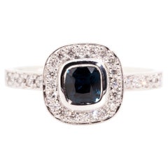 18 Carat White Gold Cushion Cut Blue Sapphire and Diamond Vintage Halo Ring
