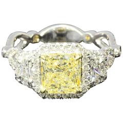 1.57 Carat Radiant Yellow Diamond Halo Two Color Gold Twist Engagement Ring