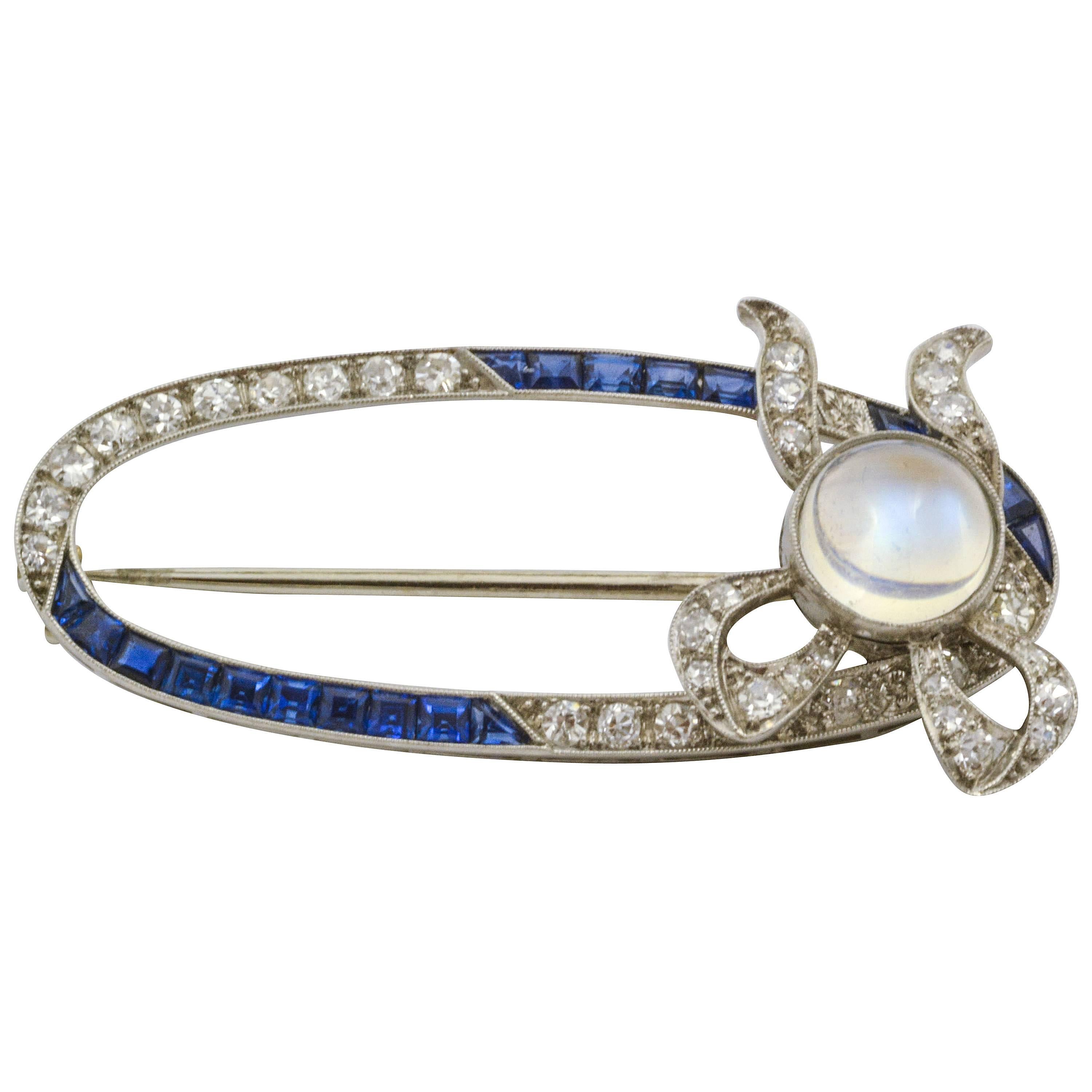 Art Deco Sapphire Moonstone Diamond Platinum Open Oval Bow Brooch Pin