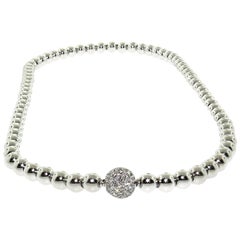 Collier en or avec centre pavé de diamants