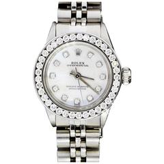 Rolex Lady's Stainless Steel Oyster Perpetual Diamond Bezel and Dial Wristwatch