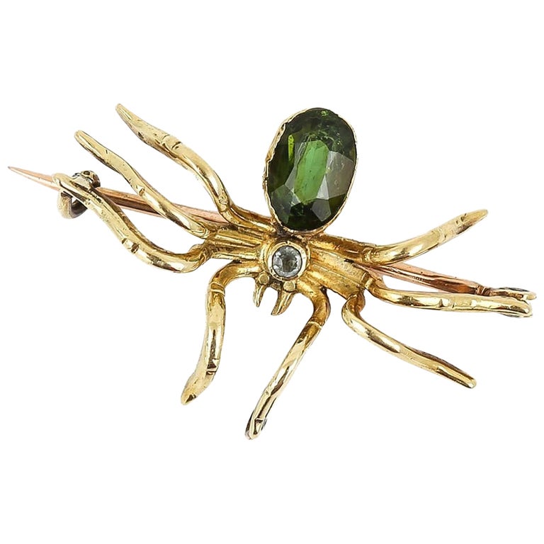 Victorian 9ct Gold Green Rhinestone and Blue Topaz Spider Brooch, Circa 1890 For Sale