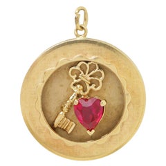 14 Karat Yellow Gold Retro Charm with Red Stone Heart & Key