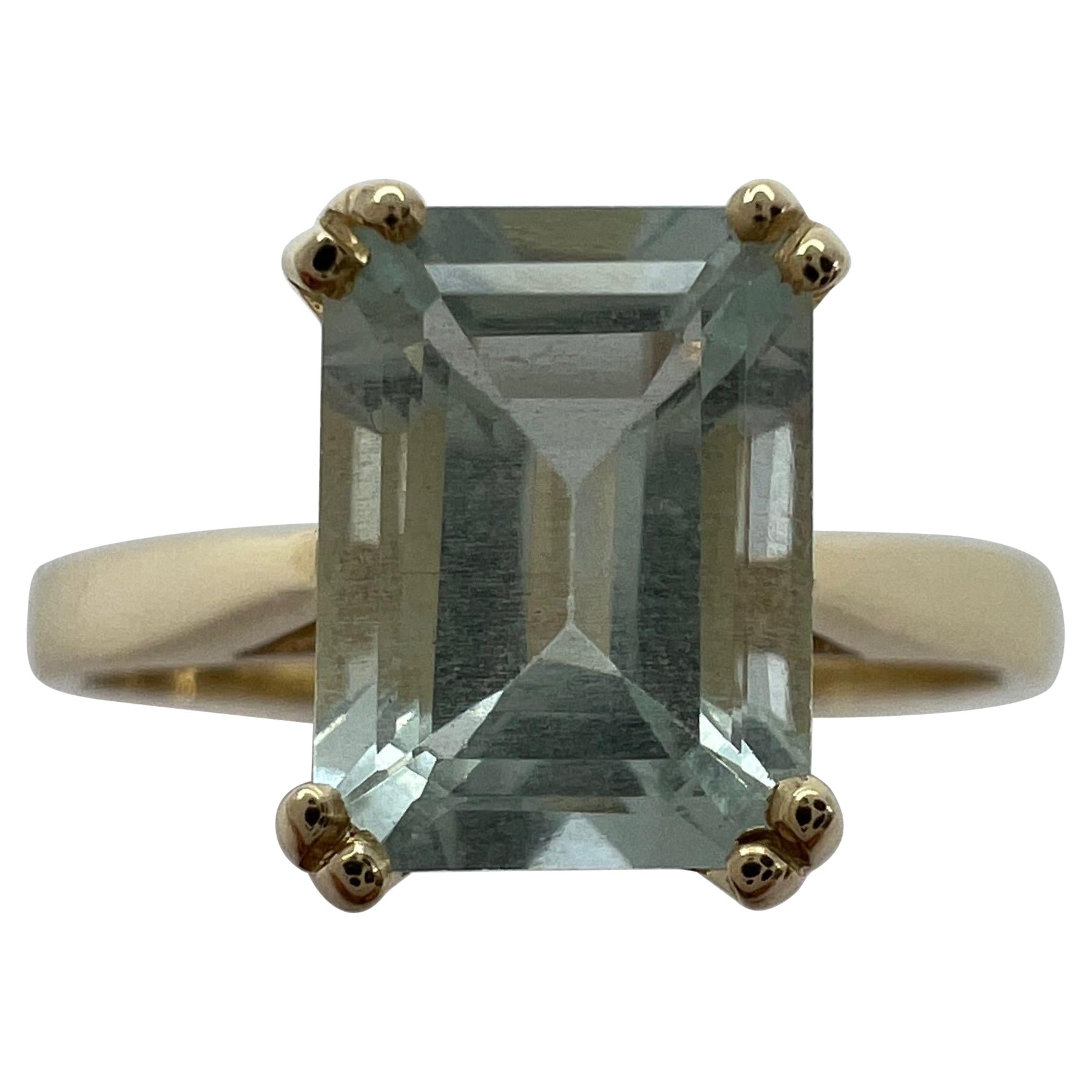 1.50 Carat Blue Aquamarine Emerald Octagon Cut Yellow Gold Solitaire Ring For Sale