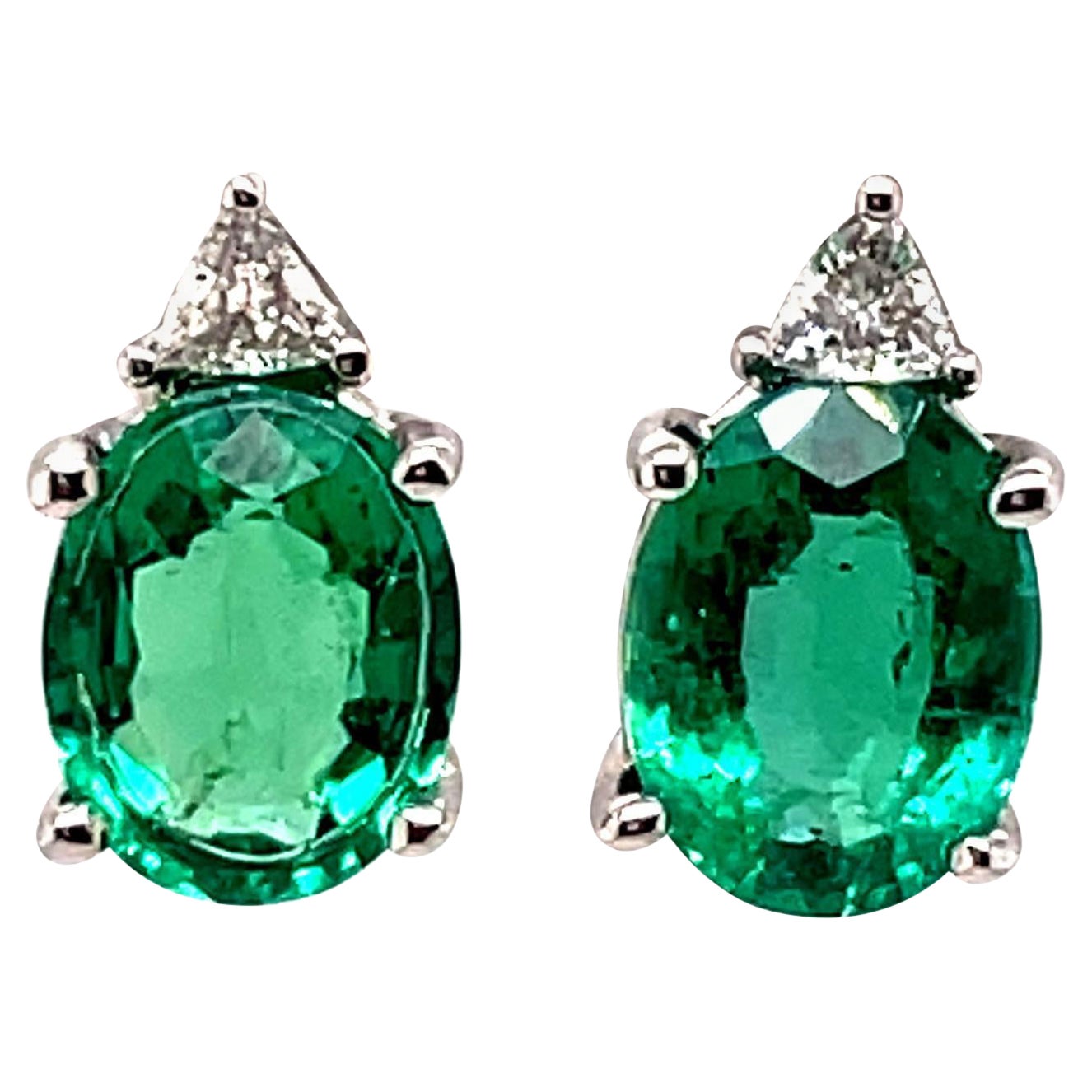 3.02ct Oval Emeralds with Triliiant Diamonds 18k White Gold Stud Earrings For Sale