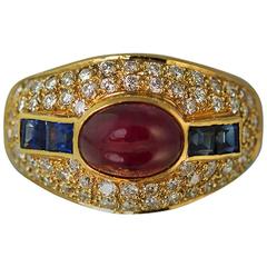 Bague en or avec rubis, saphir et diamants