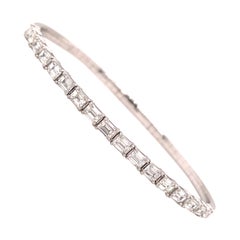 Bracciale flessibile con diamante e smeraldo in oro bianco 14K