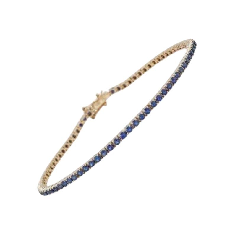 Bracelet tennis en or jaune 14 carats avec saphirs bleus - 16,51 cm