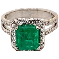 2.40 Carat Emerald Cut Emerald with Diamond Halo Ring White Gold