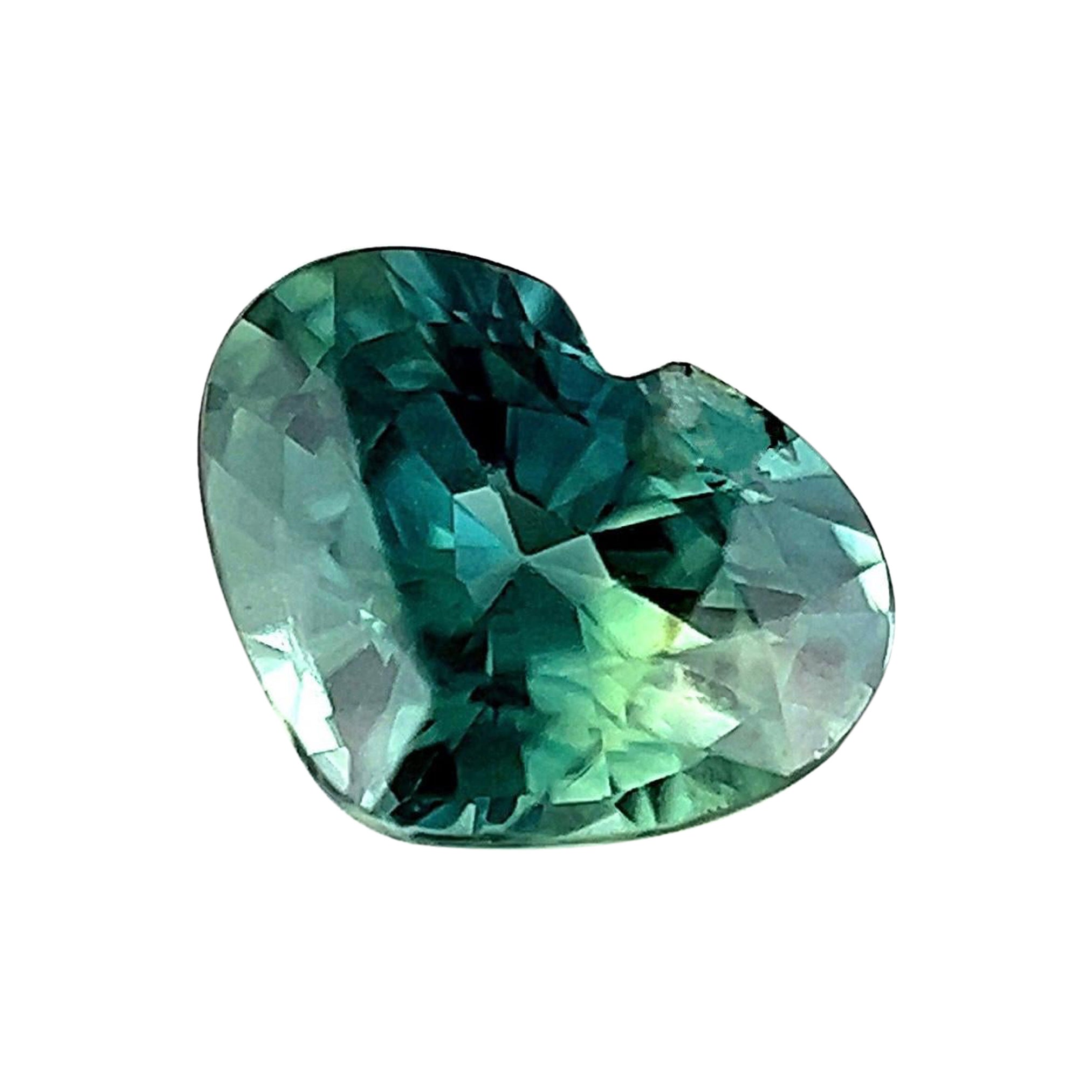 Fine pierre précieuse rare saphir australien bleu vert bicolore taille cœur de 0,91 carat