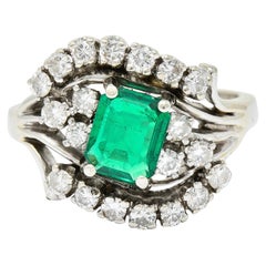 1950's Mid-Century 1.59 Carats Emerald Diamond 14 Karat White Gold Bypass Ring