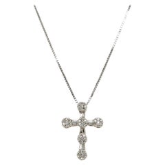 Croix pendentif en or 14 carats et diamants