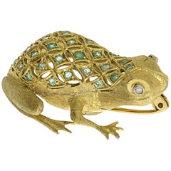Broche grenouille en or avec émeraude et diamants