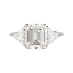 Alexander EGL Certified 2.85 Carat Emerald Cut Diamond Three-Stone Ring 18k