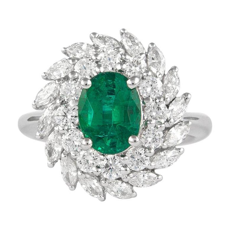 Alexander 1.30 Carat Emerald with Double Diamond Halo Ring 18 Karat White Gold For Sale