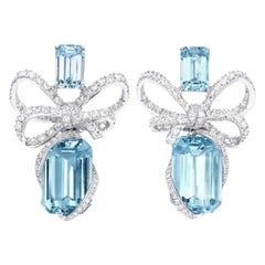 18 Karat White Gold, White Diamonds and Aquamarine Bow Earrings